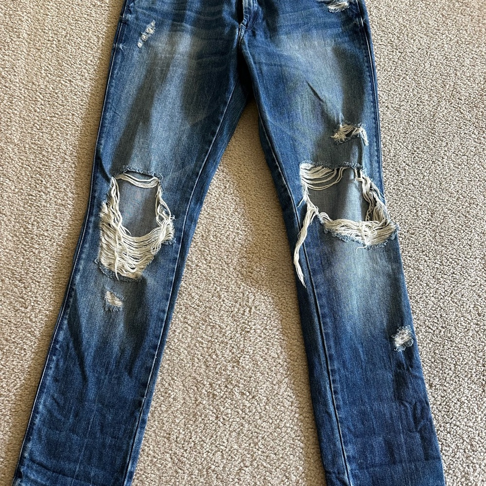 Distressed Blue Jeans